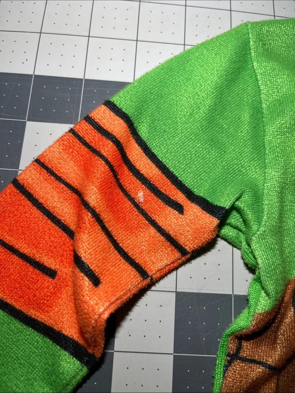 Kids Green Turtle Shell Pajama Top with Orange Sleeve Accents